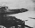 Two Japanese transports, beached and burning after U.S. air attack near Tassafaronga, Guadalcanal on November 15, 1942.