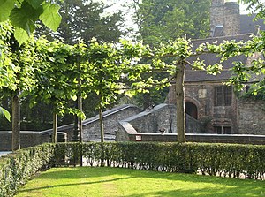 Bruges (Belgium): garden of the Gruuthusemuseum and St Boniface bridge in the morning light