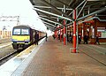 A Silverlink Class 321 local train from Birmingham at Rugby railway station