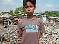 Boy living on a trash dump, Jakarta Indonesia.