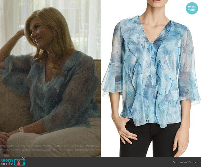 Debra’s blue printed ruffled top on Dirty John