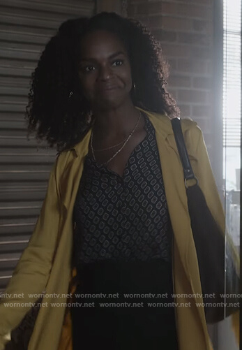 Angela's yellow trench coat on What/If