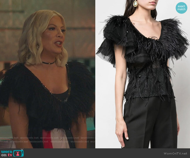 Tori’s black feather-trim v-neck top on BH90210