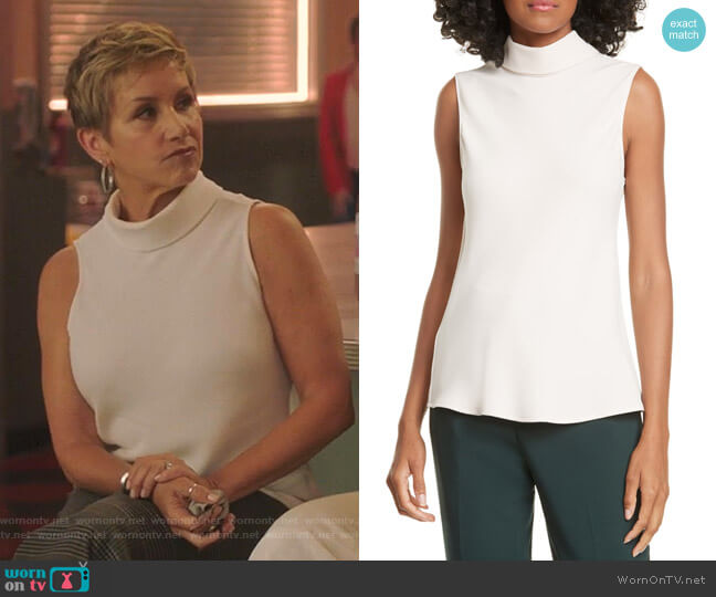 Gabrielle’s white sleeveless top on BH90210