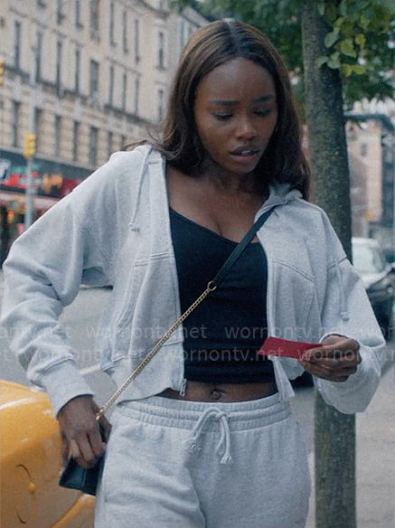 Vivian's grey sweatshirt and Coach logo bag on American Horror Stories