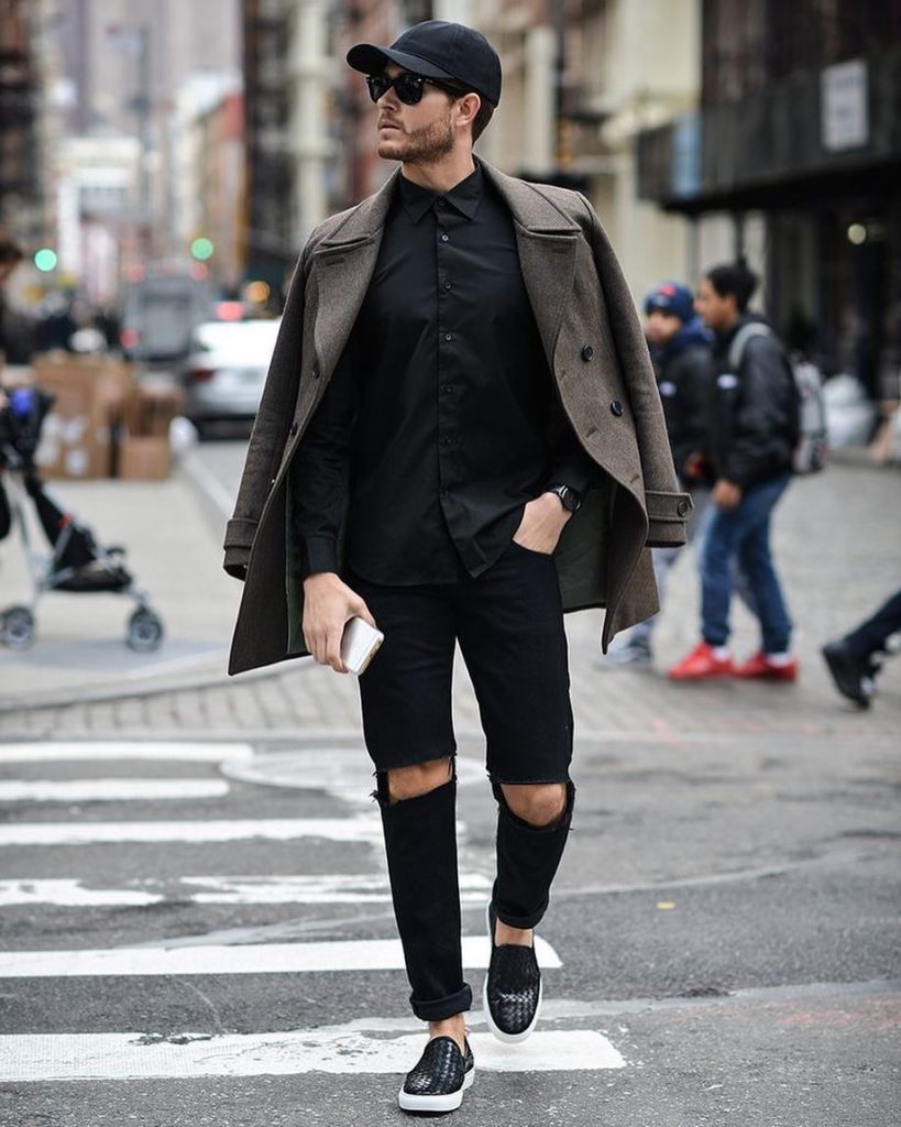 Black shirt, peacoat, black jeans, slip-on shoes