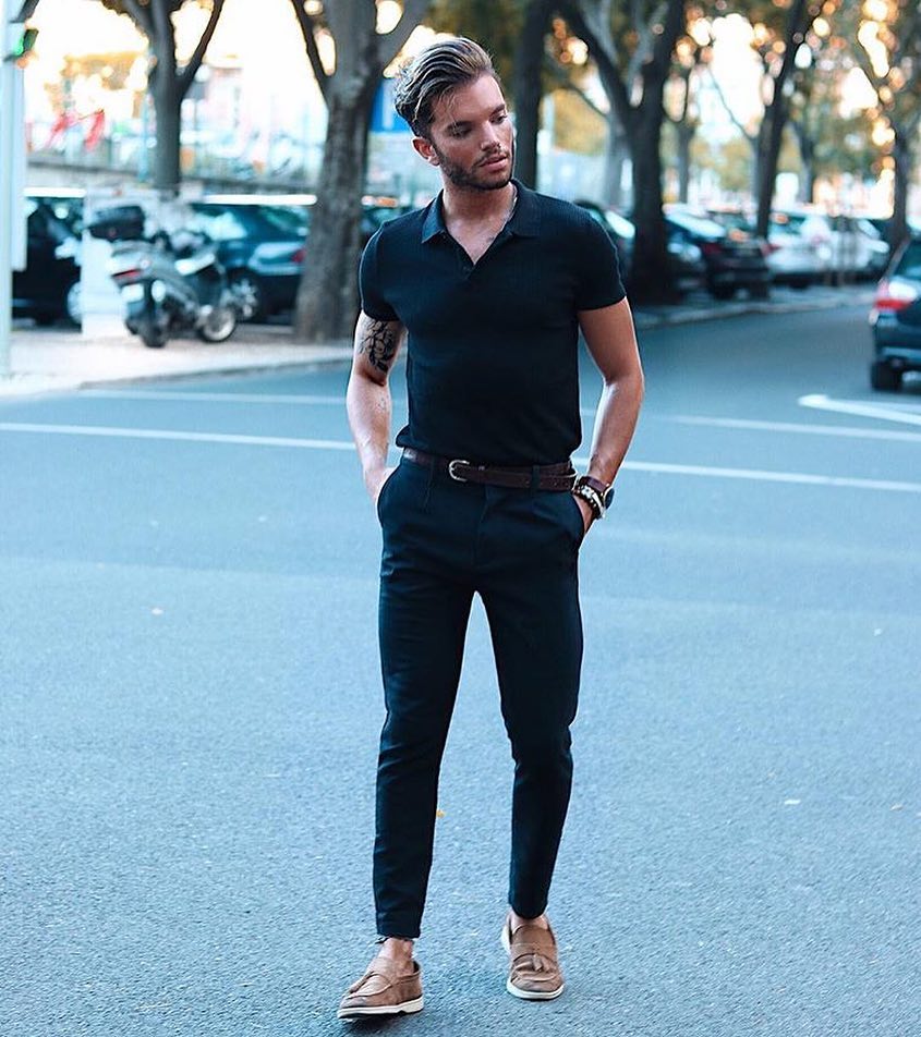 Black polo shirt, black dress pants, loafers