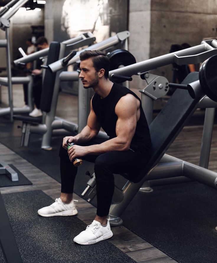 Black tank top, sport pants, training shoes