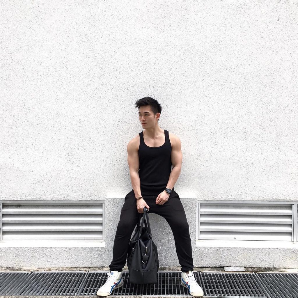 Black singlet, sport pants, training shoes