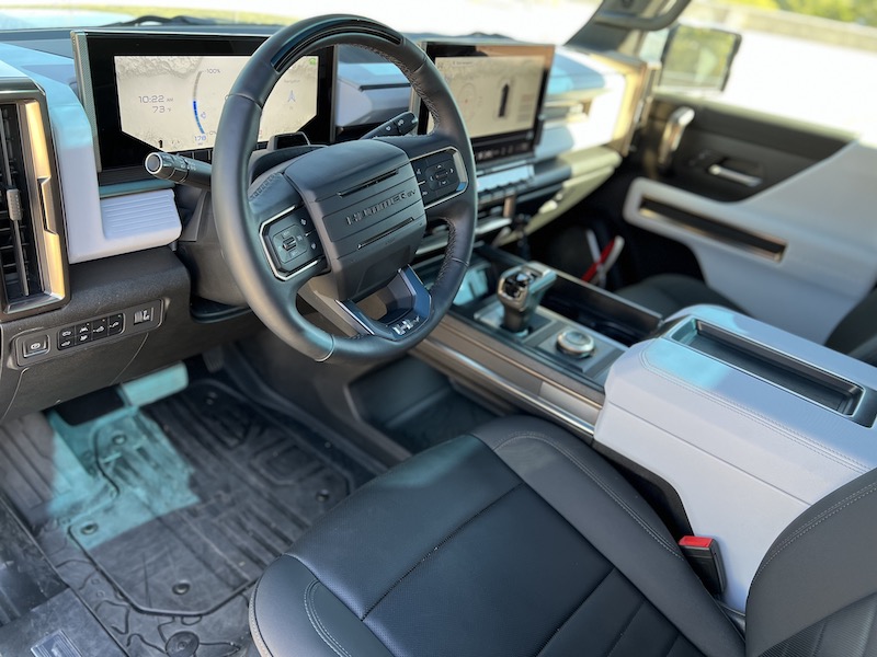 The Surface Of The Moon Is Seen On The Hummer'S Floor Mats, And Notice That Nice Storage Space Underneath!