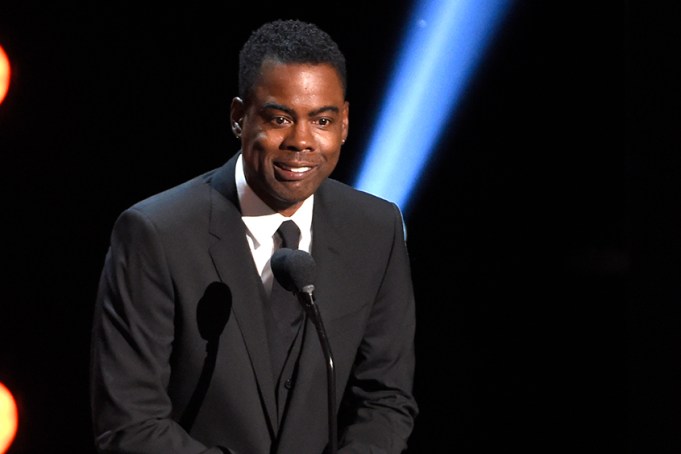 FILE - In this March 30, 2019 file photo, Chris Rock presents the award for outstanding comedy series at the 50th annual NAACP Image Awards at the Dolby Theatre in Los Angeles. Chris Rock on Sunday, Sept. 19, 2021 said he has been diagnosed with COVID-19 and sent a message to anyone still on the fence: “Get vaccinated.”  (Photo by Chris Pizzello/Invision/AP, File)