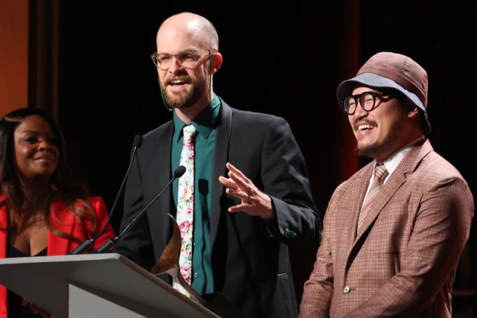 LOS ANGELES, CALIFORNIA - MARCH 05: (L-R) Daniel Scheinert and Daniel Kwan speak onstage during the 2023 Writers Guild Awards West Coast Ceremony at Fairmont Century Plaza on March 05, 2023 in Los Angeles, California. (Photo by Amy Sussman/Getty Images for WGAW)