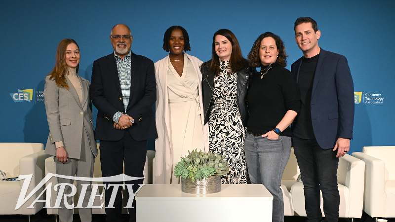 Variety Intelligence Platform's Audrey Schomer posing for a photo with execs from Roblox, National Geographic, the NFL, PepsiCo and Mastercard at CES 2024.