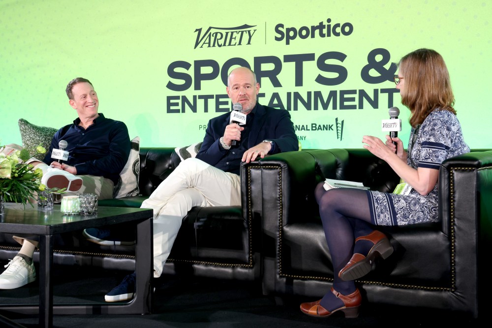 BEVERLY HILLS, CALIFORNIA - JULY 12: (L-R) Andrew Thau, Rich Eisen and Cynthia Littleton, Co-Editor-in-Chief, Variety speak onstage during Variety + Sportico's Sports and Entertainment Summit, presented by City National Bank, at The Beverly Hilton on July 12, 2024 in Beverly Hills, California.  (Photo by Phillip Faraone/Variety via Getty Images)