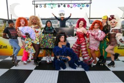 LOS ANGELES, CALIFORNIA - AUGUST 13: (L-R) Hershii LiqCour-Jeté, Amanda Tori Meating, Sapphira Cristál, Mhi'ya Iman Le'Paige, Megami, RuPaul, Q, Mirage and Dawn attend RuPaul's Drag Race Emmy nomination celebration roller rink event at EP & LP on August 13, 2024 in Los Angeles, California. (Photo by Rodin Eckenroth/Getty Images)