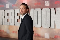 HOLLYWOOD, CALIFORNIA - DECEMBER 13: Charlie Hunnam attends the Netflix Premiere of Zack Snyder's REBEL MOON - Part One: A Child of Fire at TCL Chinese Theatre on December 13, 2023 in Hollywood, California. (Photo by Phillip Faraone/Getty Images for Netflix)