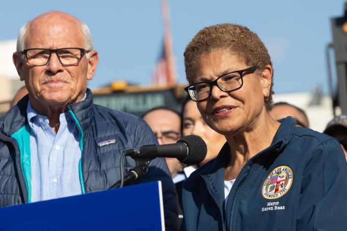 LOS ANGELES, CALIFORNIA - JANUARY 17: Los Angeles Mayor Karen Bass speaks to journalists in a press conference to announce Steve Soboroff (left) to lead L.A.'s wildfire rebuilding and recovery efforts on January 17, 2025 in Los Angeles, California. The announcement follows the devastating Palisades Fire, which erupted 10 days ago in Pacific Palisades, claiming at least 25 lives and destroying more than 3,500 structures across the area. Meanwhile, outside Los Angeles and beyond Mayor Karen Bass' jurisdiction, the Eaton Fire continues to burn in Altadena, northeast of the city. (Photo by Apu Gomes/Getty Images)