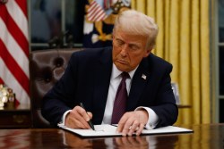 WASHINGTON, DC - JANUARY 20: President Donald Trump signs executive orders in the Oval Office of the White House on January 20, 2025 in Washington, DC.  Trump takes office for his second term as the 47th president of the United States. (Photo by Anna Moneymaker/Getty Images)