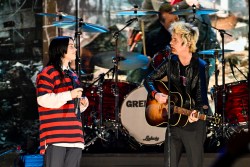 INGLEWOOD, CALIFORNIA - JANUARY 30: (L-R) Billie Eilish performs onstage with Billie Joe Armstrong of Green Day during the FIREAID Benefit Concert for California Fire Relief at The Kia Forum on January 30, 2025 in Inglewood, California.  (Photo by Scott Dudelson/Getty Images for FIREAID)