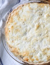 a top down image of an old fashioned tomato pie fresh out of the oven