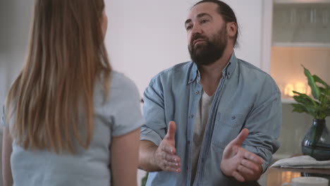 Bearded-Man-And-Woman-Having-An-Argument-3