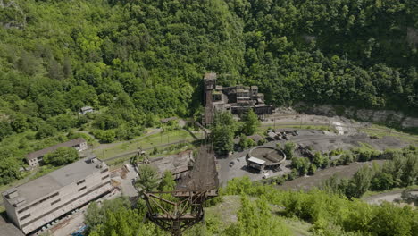 Rusty-freight-ropeway-leading-to-abandoned-mining-factory-in-Georgia