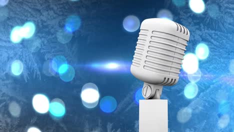 Retro-white-microphone-against-spots-of-light-against-blue-background