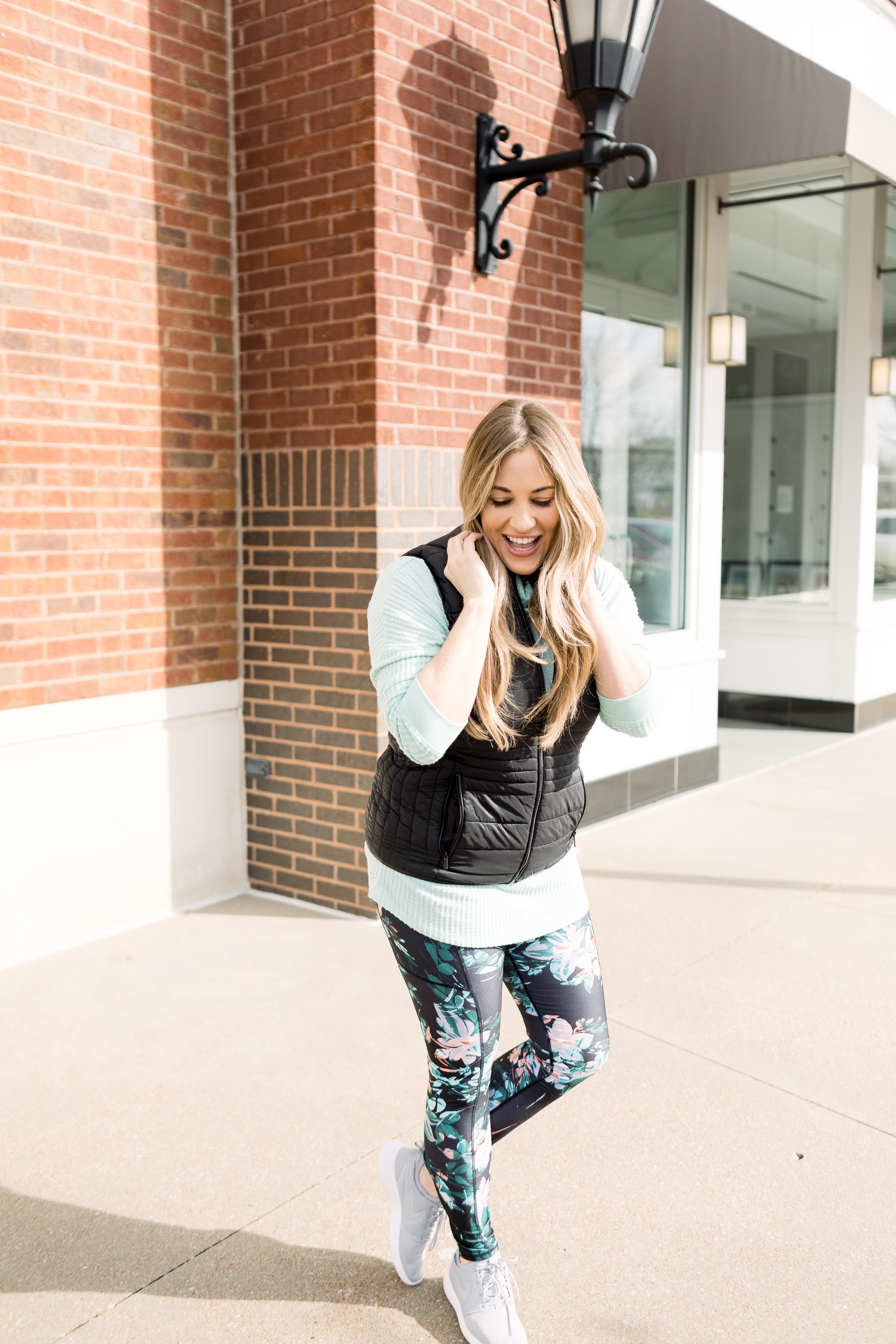 Top 10 Best Shoes for Working Out featured by top Memphis fitness blog, Walking in Memphis in High Heels: image of a woman wearing Nike Odyssey React Flyknit 2.