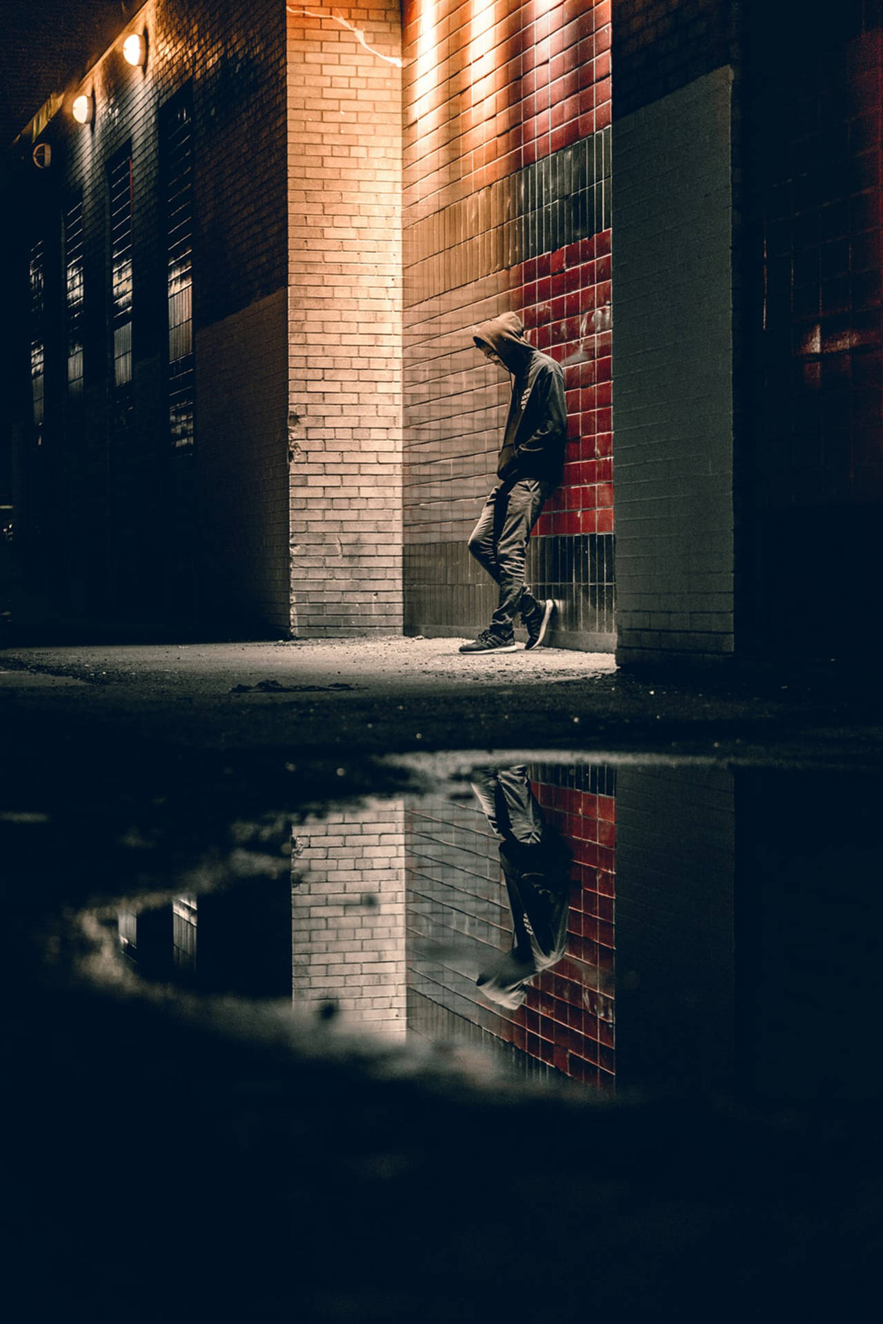 Sad Boy At Building Facade Wallpaper