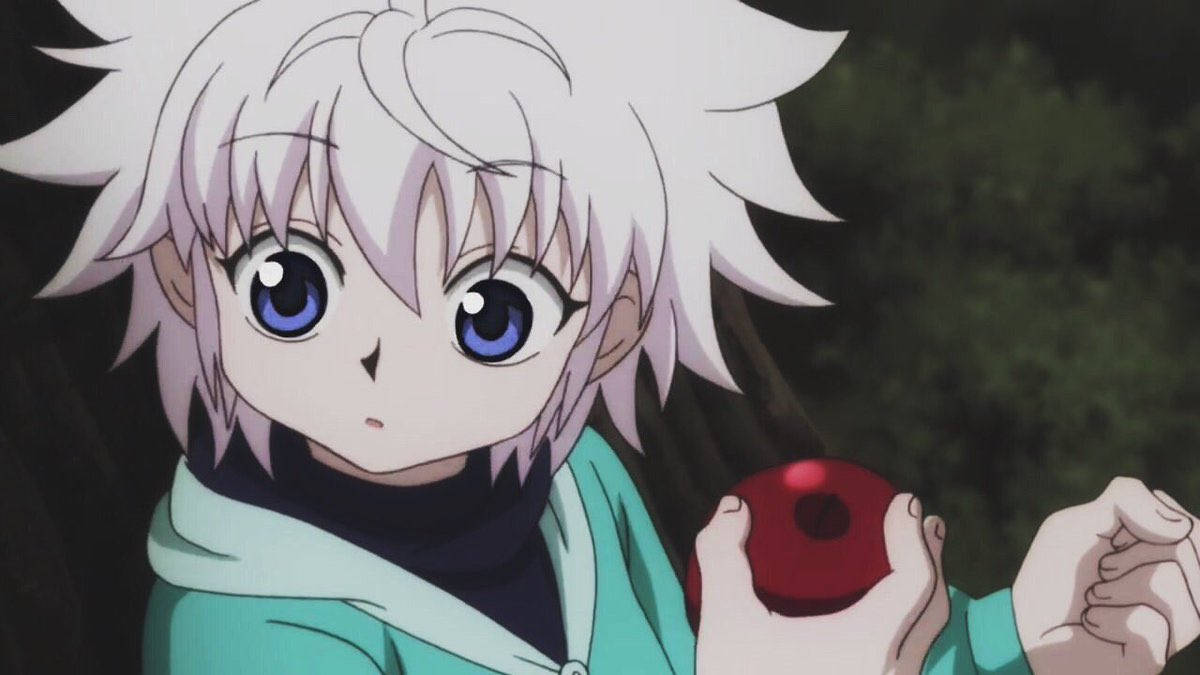 Young Cute Killua Eating An Apple Wallpaper