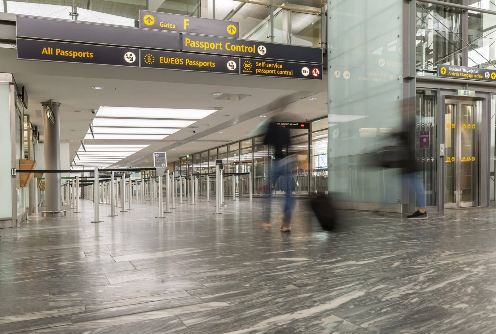 Tourists arriving at the airport passport control - subjects out of focus