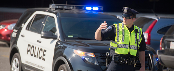 A police officer directing traffic in a street