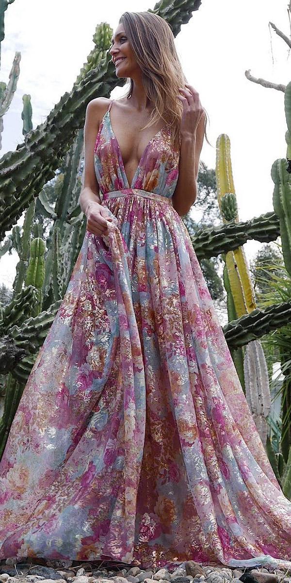 Long summer wedding guest dress with spaghetti straps and floral details