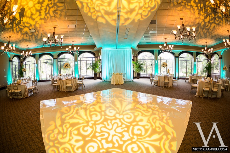 Mystic Dunes Resort and Golf Club - indoor reception space with designs projected onto ceiling and floor