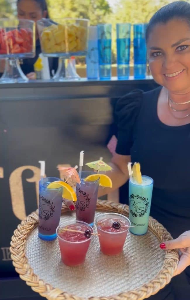 tray of different drinks held by a server, Orlando, FL