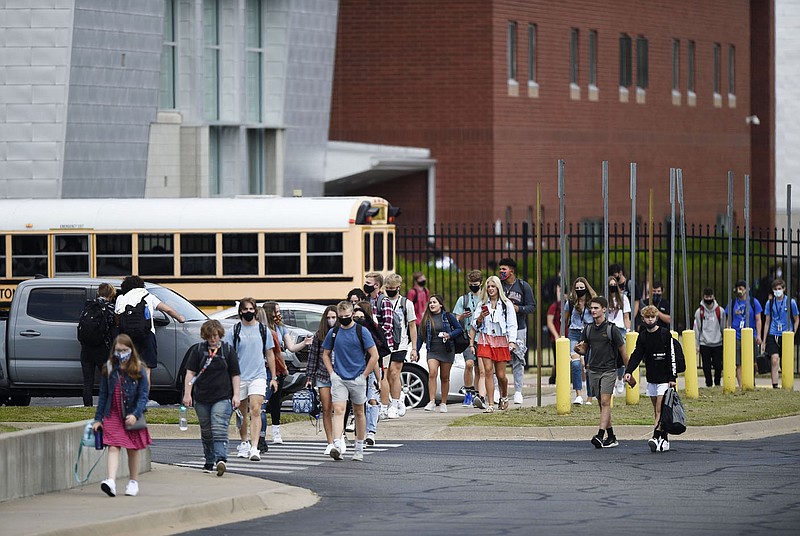 Students end the school day, Monday, August 24, 2020 at Bentonville High School in Bentonville. Check out nwaonline.com/200825Daily/ for today's photo gallery. 
(NWA Democrat-Gazette/Charlie Kaijo)