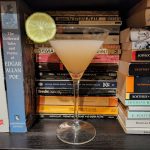 A Hemingway Daiquiri on a bookshelf.