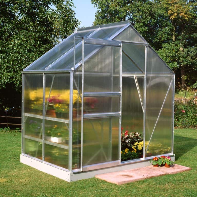 6'x4' Halls Aluminium Frame Polycarbonate Greenhouse for effective plant growth and protection in any garden.