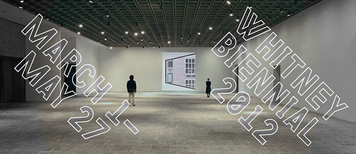 Two people standing in an empty gallery at the Whitney.