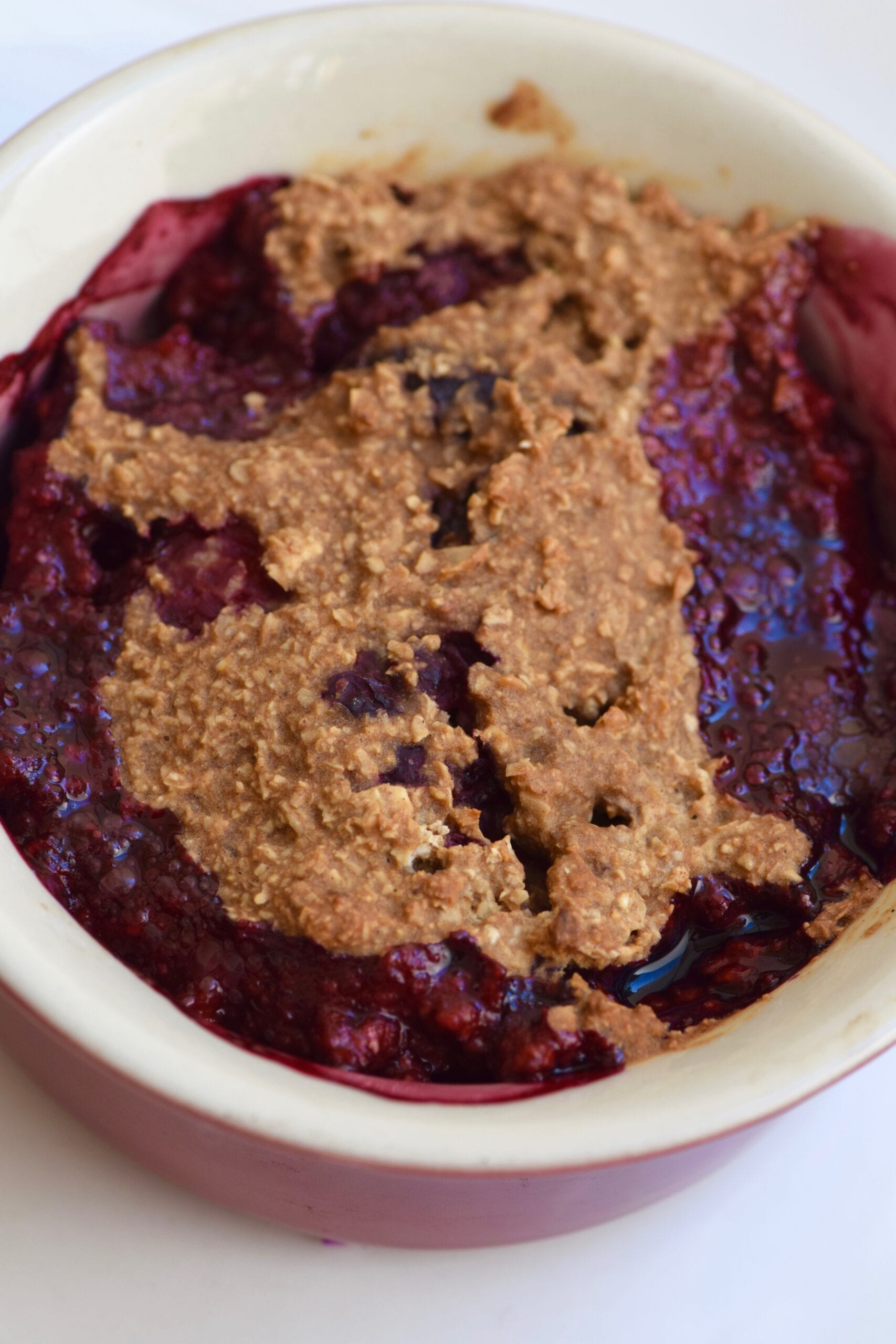 Single serving blueberry cobbler in a ramekin