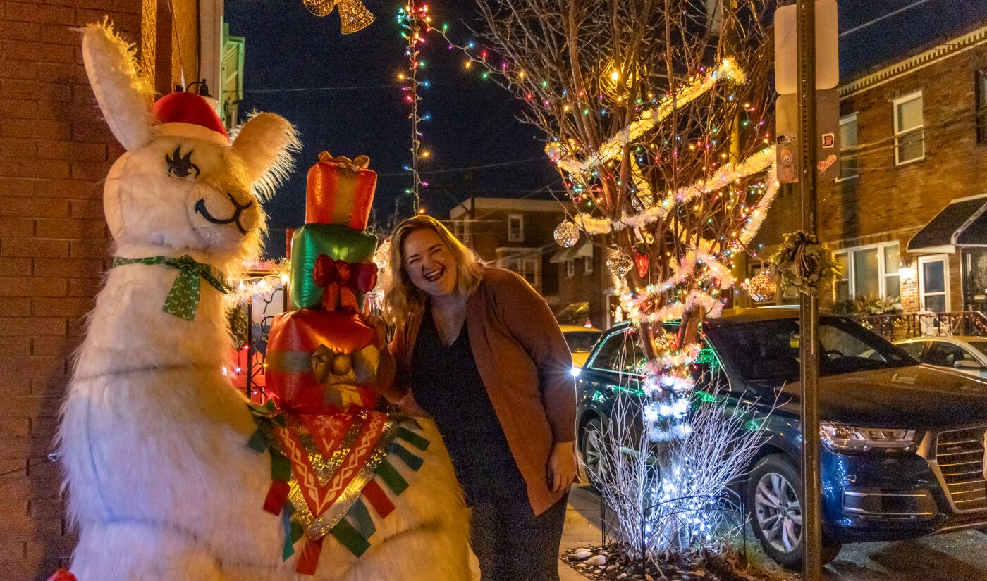 Zoe Fox with her beloved holiday llama