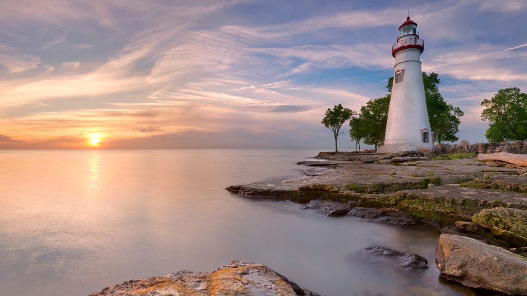 The Marblehead Lighthouse on the edge of Lake Erie at sunrise, Ohio, USA