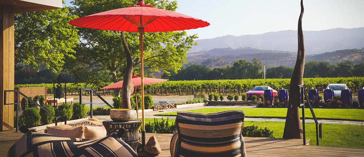 outside a wine tasting room with view of vineyards