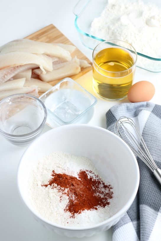 Mixing the dry ingredients for the beer-battered Baja Fish Tacos recipe.