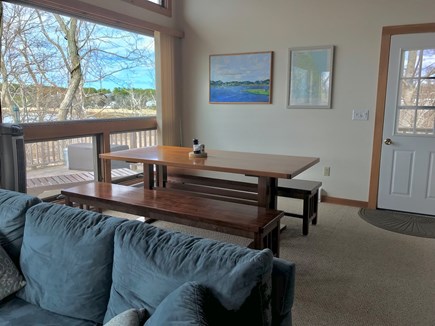 Wellfleet Cape Cod vacation rental - Dining area with large trestle table with views of Harbor.