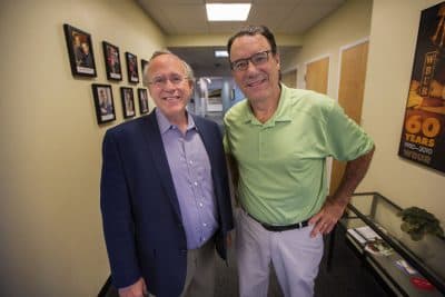 Robert Stern, director of Clinical Research at BU's Chronic Traumatic Encephalopathy Center, and former New England Patriot safety Tim Fox. (Jesse Costa/WBUR)