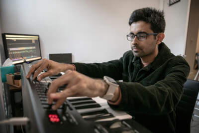 Pranav Swaroop in his home studio in Boston. (Robin Lubbock/WBUR)