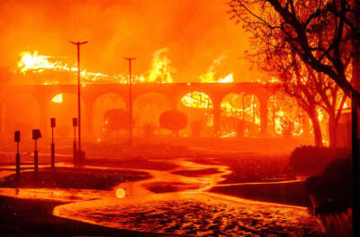 The Pasadena Jewish Temple & Center burns during the Eaton fire in Pasadena, California on January 7, 2025. (Photo by JOSH EDELSON/AFP via Getty Images)