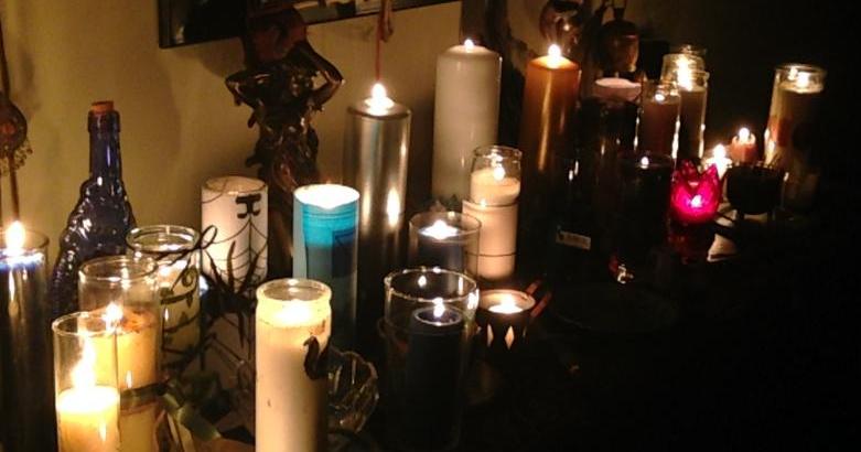 Lit Imbolc Dedication Candles on the Coven Altar