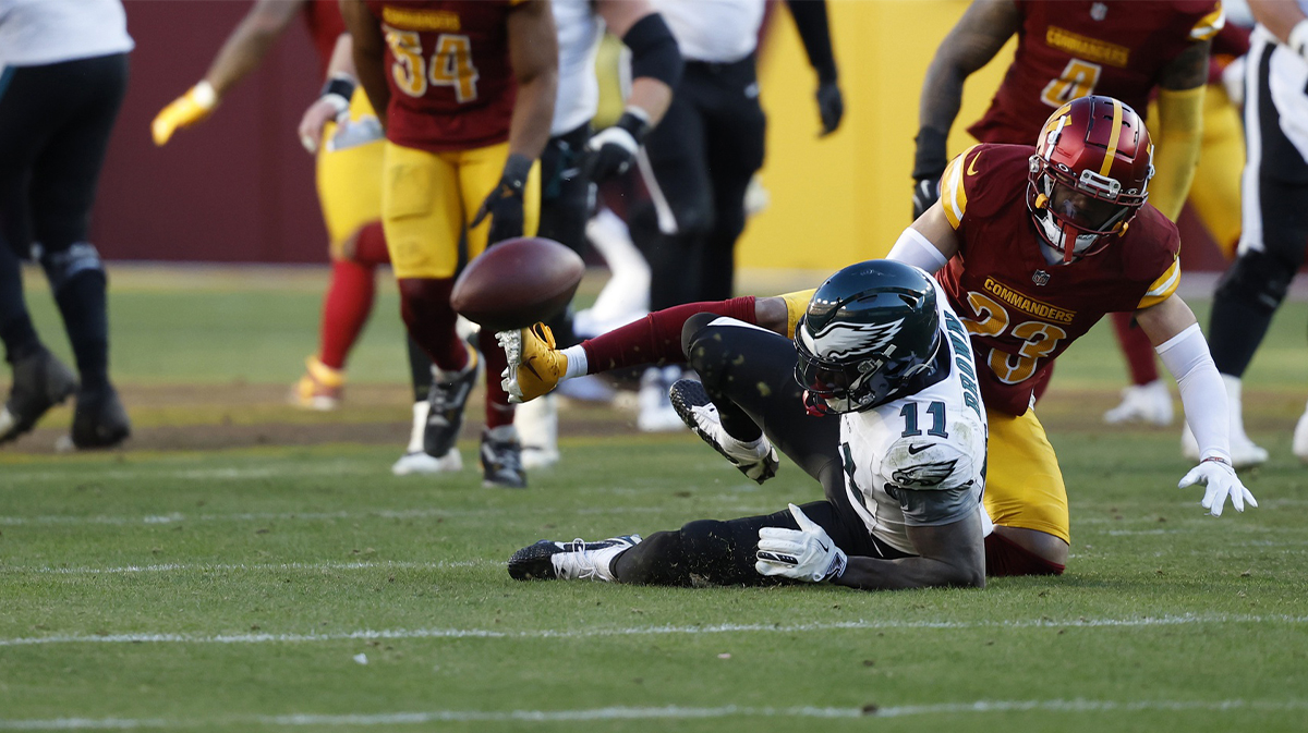 Washington Commanders cornerback Marshon Lattimore (23) defends a pass intended for Philadelphia Eagles wide receiver A.J. Brown (11) during the third quarter at Northwest Stadium. 